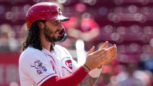 Cincinnati Reds second baseman Jonathan India (6) applauds a TJ Friedl RBI single in the third inning of the MLB Interleague game between the Cincinnati Reds and the Minnesota Twins at Great American Ball Park in downtown Cincinnati on Wednesday, Sept. 20, 2023.  